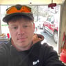 Green jacket lawn care profile image
