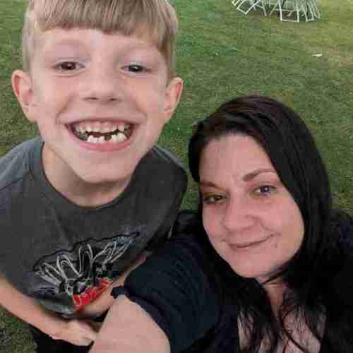 Amber and son pushmowers r us Logo